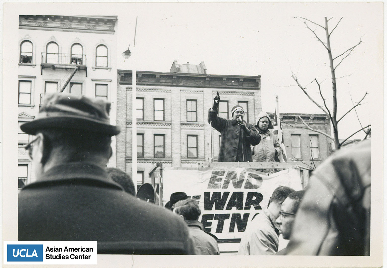 Black and white photograph of a demonstration for the end of the Vietnam War.